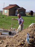 Stortbaas Piet wacht op het beton